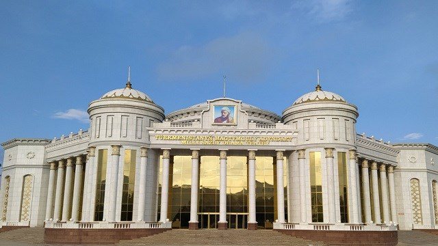 Facade of the National Music and Drama Theatre in Ashgabat with colonnade and glazed entrance