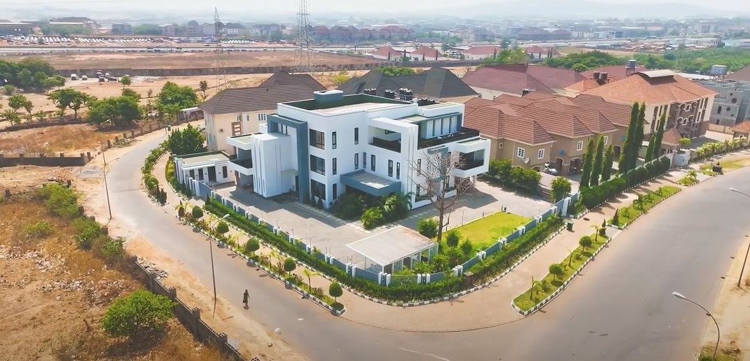 Aerial view of a white modernist residential building in Abuja, Nigeria