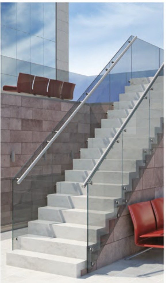 Glass balustrade with a stainless top handrail running alongside an external stone stair