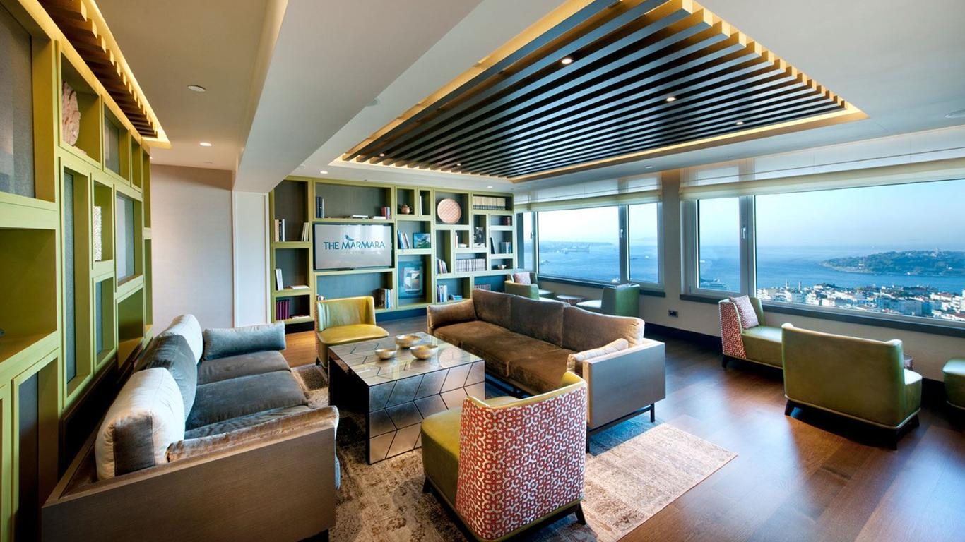 Lounge at The Marmara Hotel Istanbul with corner glazing overlooking the city and sea